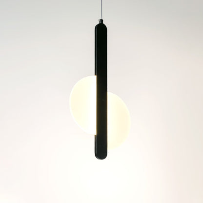 Black pendant light with integrated frosted diffuser casting warm illumination for stylish modern interiors.