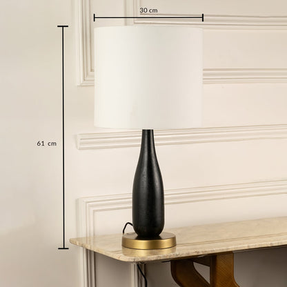Black ceramic table lamp with white fabric shade measuring 61 cm height and 30 cm width for elegant table lighting.