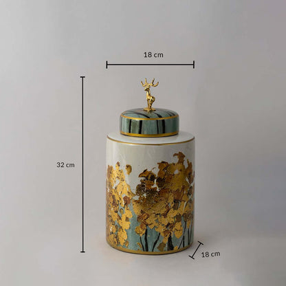 Cylindrical ceramic jar with gold tree texture and teal deer lid shown with 32 cm height and 18 cm width for size guide.