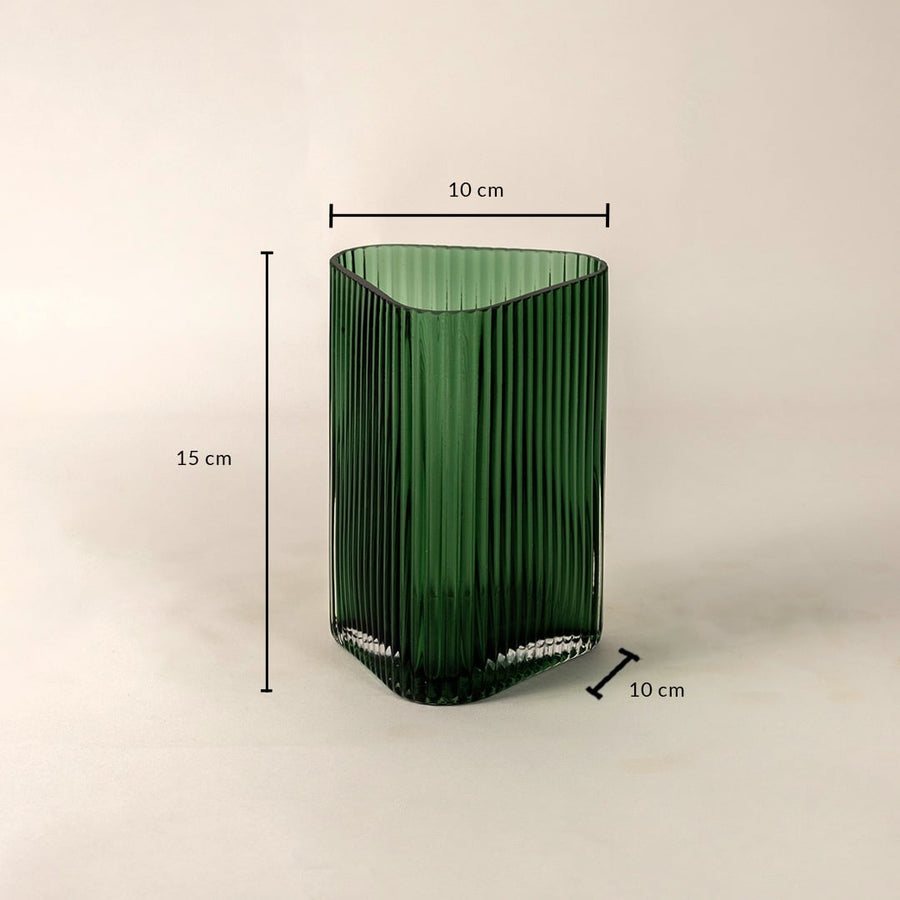 Green ribbed glass vase with 15 cm height and 10 cm width shown on white background for accurate size and proportion reference.