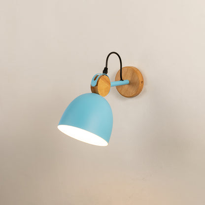 Modern wall light with blue metal shade and wooden backplate ideal for bedroom bedside or living room wall decor on clean background.