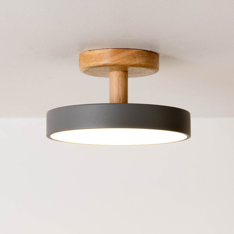 Modern black metal and natural wood ceiling light for stylish hallway bedroom and contemporary decor spaces.