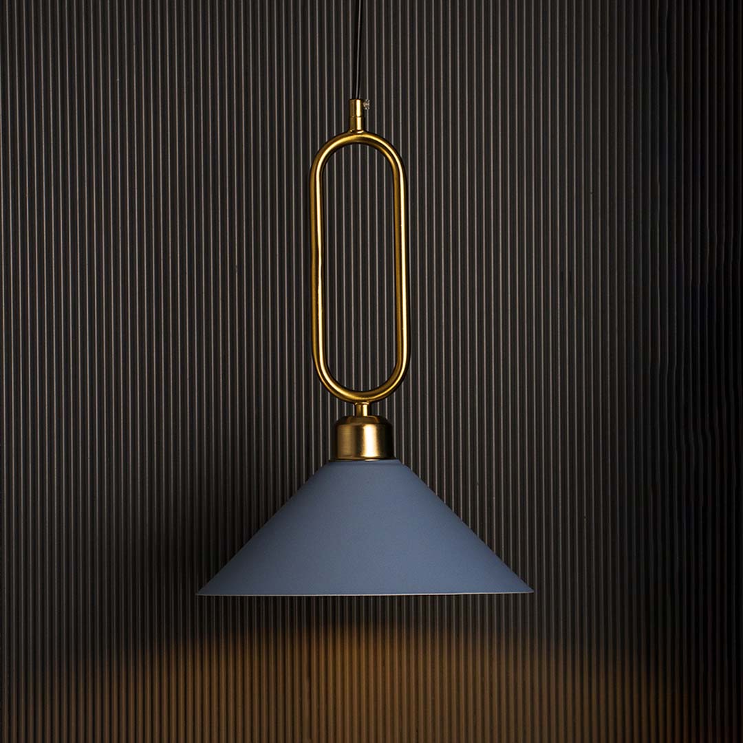 Blue conical pendant ceiling light with gold frame glowing beautifully against black background adding luxury to home interiors.