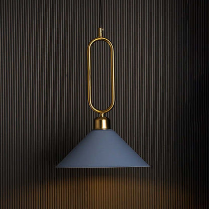 Blue conical pendant ceiling light with gold frame glowing beautifully against black background adding luxury to home interiors.