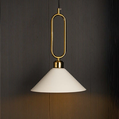 White conical pendant ceiling light with gold metal frame glowing warmly against black background creating stylish luxury interior.
