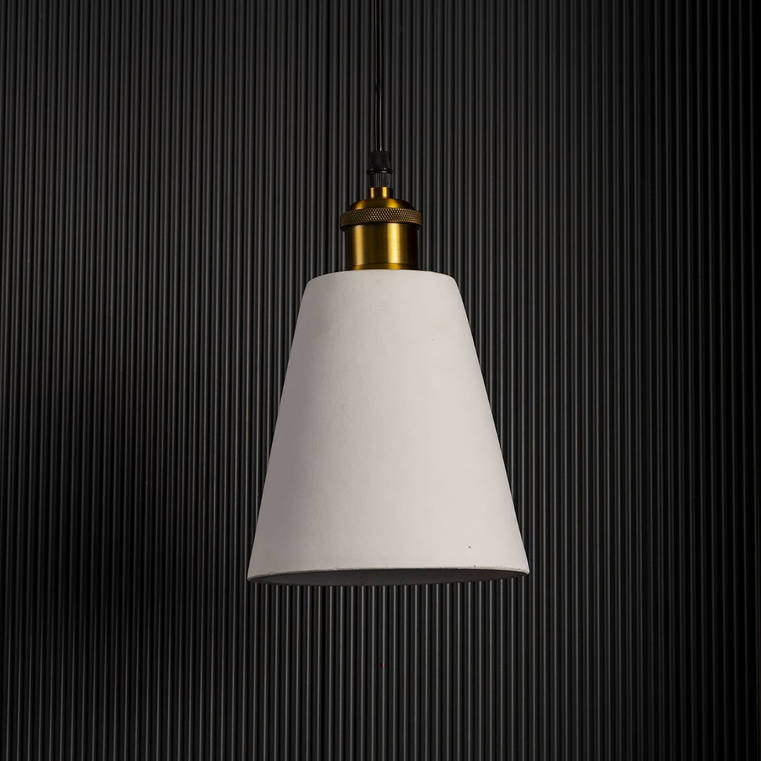 White cone pendant lamp turned off against a dark background highlighting its refined silhouette.