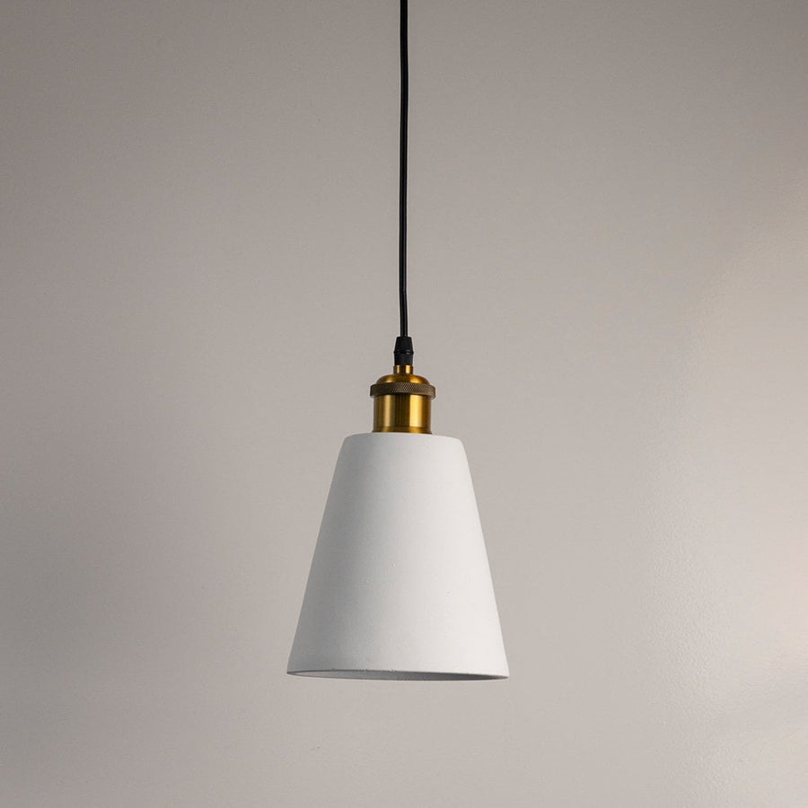 White cone pendant light turned off with smooth matte texture and brass accent displayed against a white background.