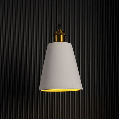 White cone pendant lamp glowing softly against a dark background highlighting its refined silhouette.