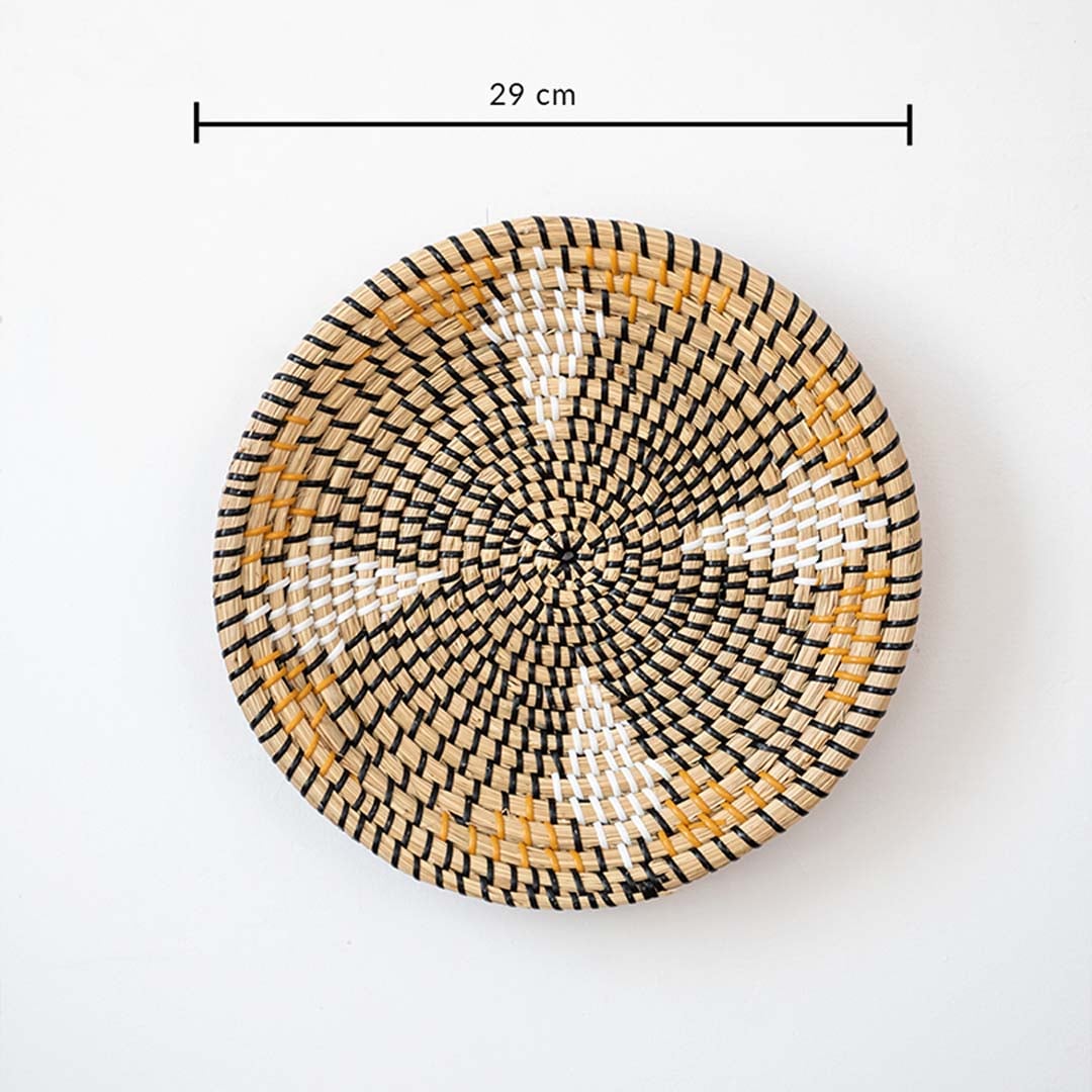 Circular woven wall basket with yellow black and natural design showing 27 cm diameter ideal for accent wall decor styling.