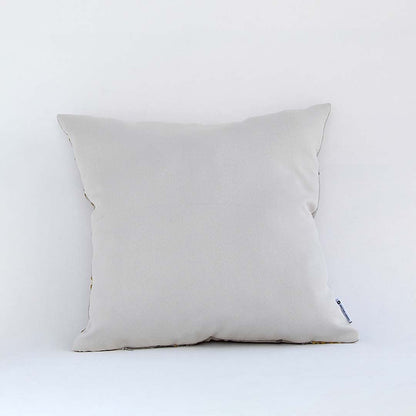 Back view of beige embroidered cushion cover with zipper closure is a decorative pillow cover for sofas and chairs.