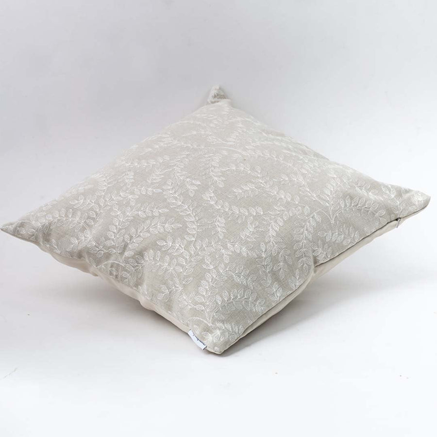 Square cushion cover 40x40 cm in beige with embroidered white leaf pattern and soft fabric for sofa and bed.