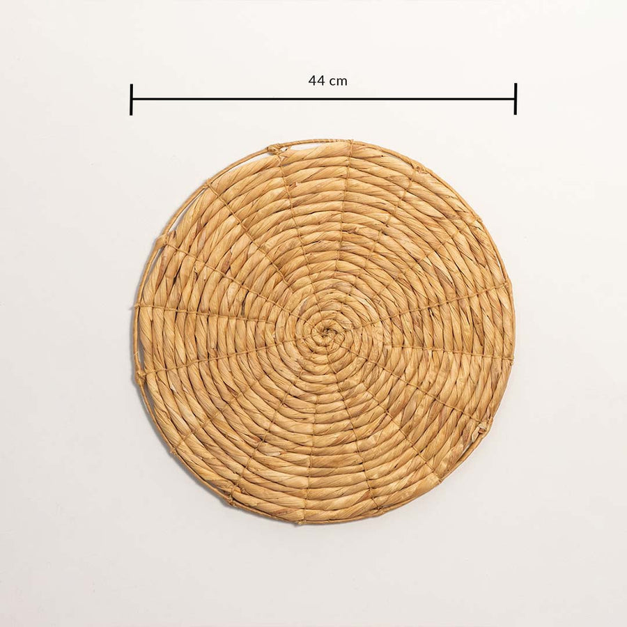 Woven wall plate 44 cm in rustic natural fibers artisan handmade decor shown on white background