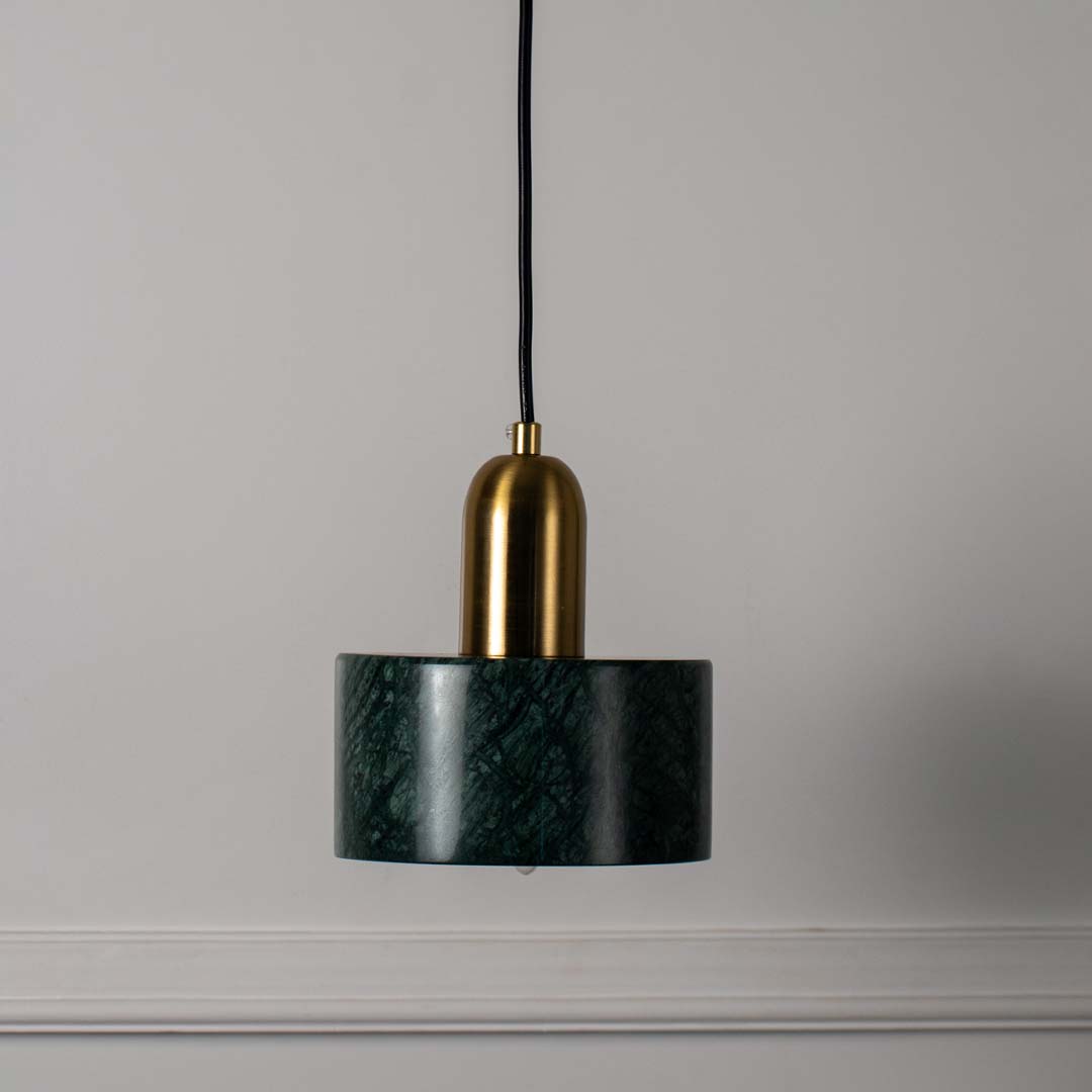 Modern green marble and gold pendant ceiling light featured on off white background adding luxury and elegance to interiors.