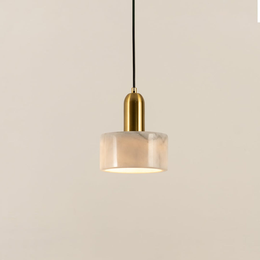 White marble pendant light with polished gold fittings crafted for stylish contemporary interiors.