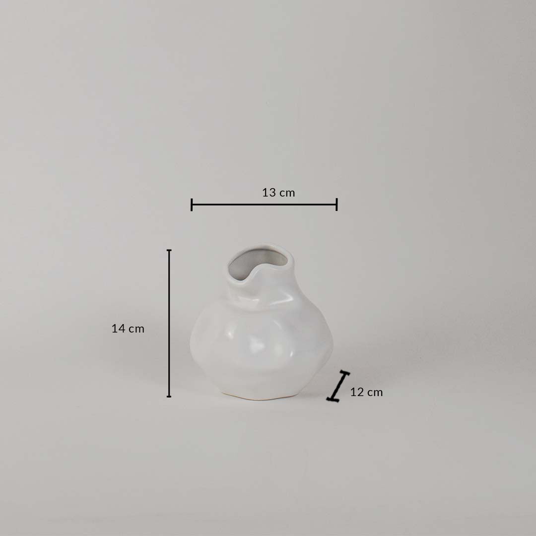 White ceramic vase measuring 14 cm height 13 cm width and 12 cm depth shown on white background for decor reference.