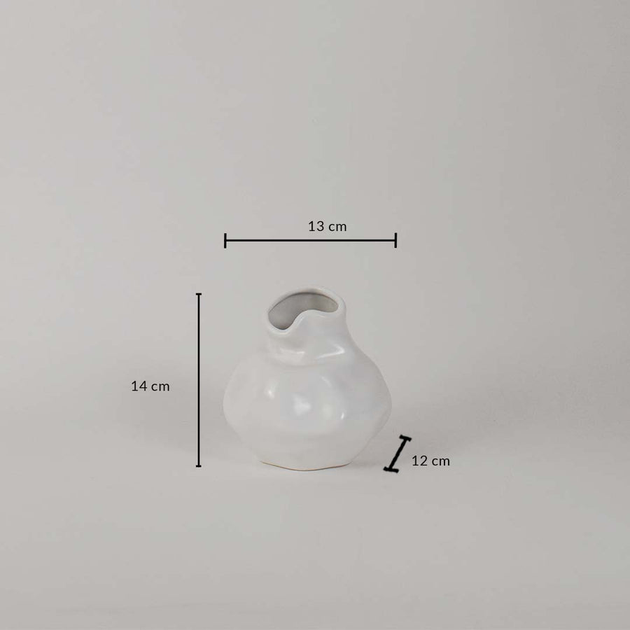 White ceramic vase measuring 14 cm height 13 cm width and 12 cm depth shown on white background for decor reference.