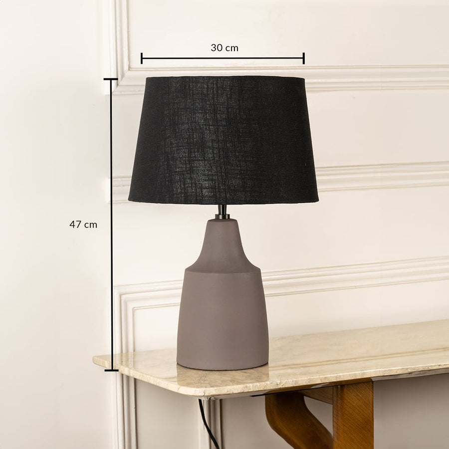 Taupe ceramic table lamp with black fabric shade measuring 47 cm height and 30 cm width for contemporary decor lighting.