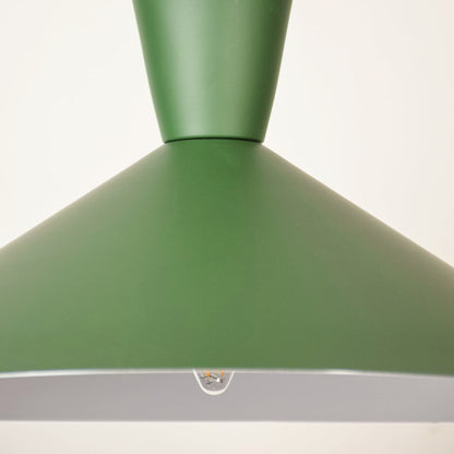 Green cone pendant light shown in close up view against soft white background with light off for earthy modern décor.