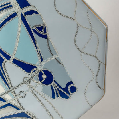 Octagon shaped ceramic jar with blue abstract equestrian artwork captured in a closeup view showing intricate brushstrokes fluid design and modern artistic décor suitable for stylish coastal homes.