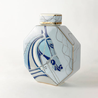 Blue and white ceramic jar with abstract wave design perfect for modern coastal décor bringing artistic movement serene detailing and timeless craftsmanship to contemporary interior spaces.