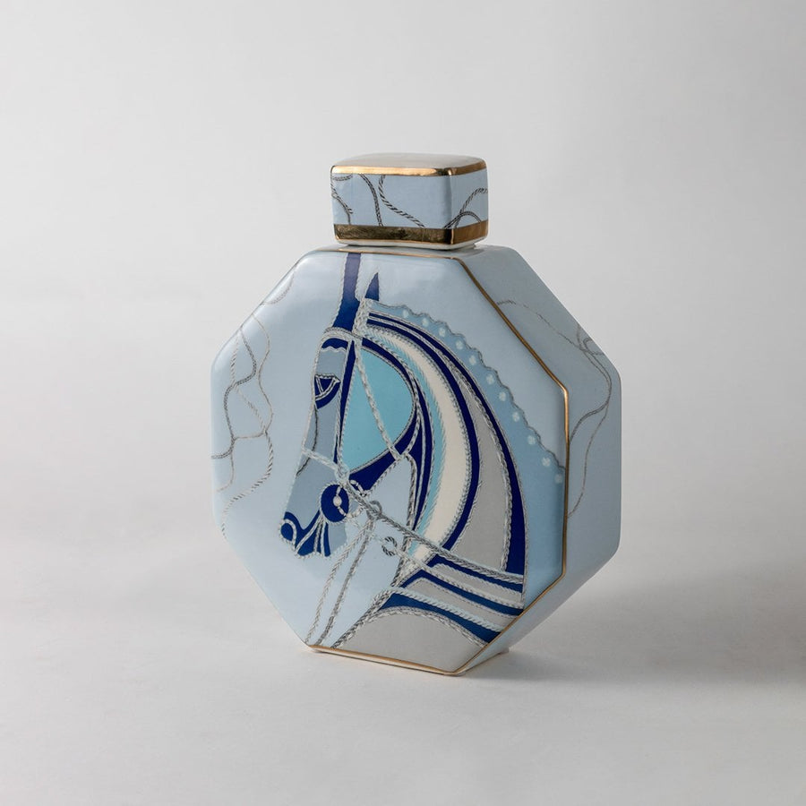White octagon ceramic jar with blue abstract horse artwork in a front view perfect for artistic décor styling and modern console display.