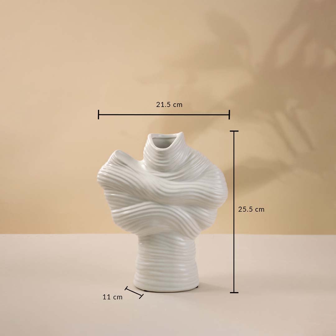 White ceramic sculptural vase shown with 25.5 cm height and 21.5 cm width measurement for elegant home decoration.