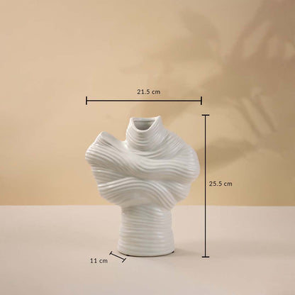 White ceramic sculptural vase shown with 25.5 cm height and 21.5 cm width measurement for elegant home decoration.
