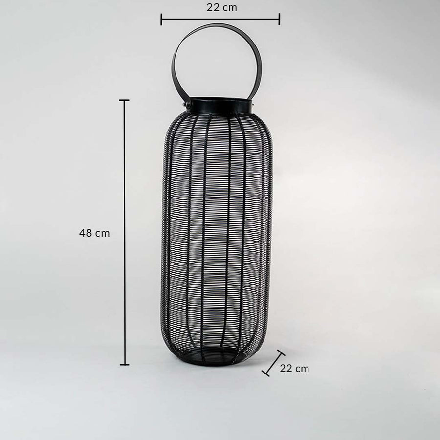 Technical sizing image of tall black lantern displaying height 48 cm and width 22 cm measurements to assist with accurate floor placement.