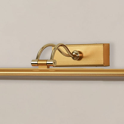 Closeup of gold adjustable picture light showing sleek metal arm and bar design for modern wall lighting and elegant home decor.