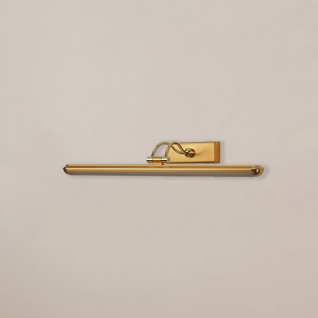 Gold adjustable picture light with light off shown on white background perfect for wall art lighting in living rooms and hallways.