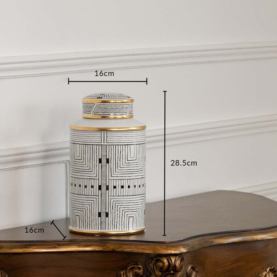 White ceramic jar with architectural artwork in a front view measuring 12 cm width and 26.4 cm height perfect for classic décor styling.