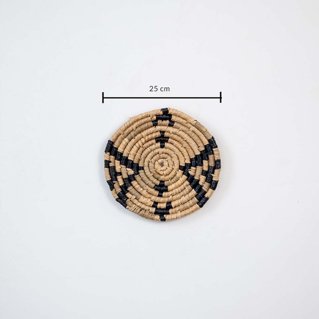 Handwoven jute round wall basket decor in beige and black rustic boho style star pattern wall art piece with 25 cm size shown.