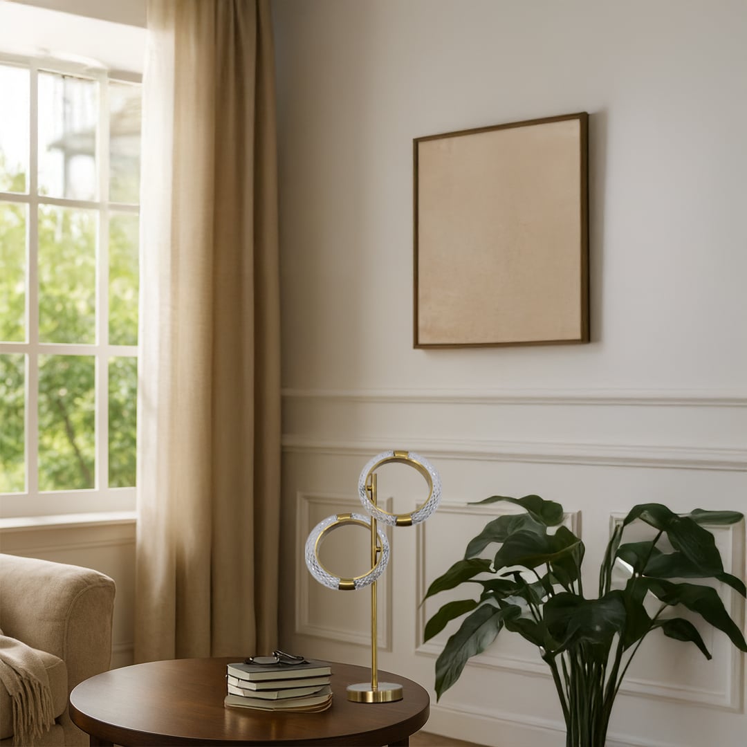 Modern crystal ring table lamp with gold base styled on wooden table in elegant living room interior decor table lamp.