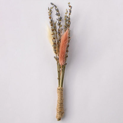 Handmade dried flower boutonniere with lavender stems pink preserved bloom and jute wrap perfect for groom wedding accessory.
