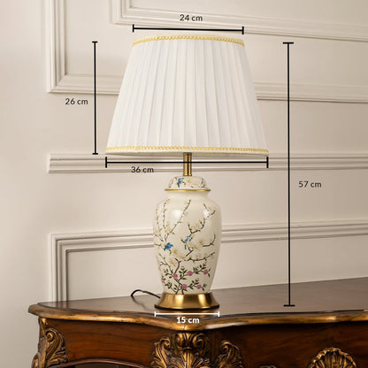 Ceramic table lamp showing 57 cm height 36 cm width and 15 cm base for accurate product dimensions.
