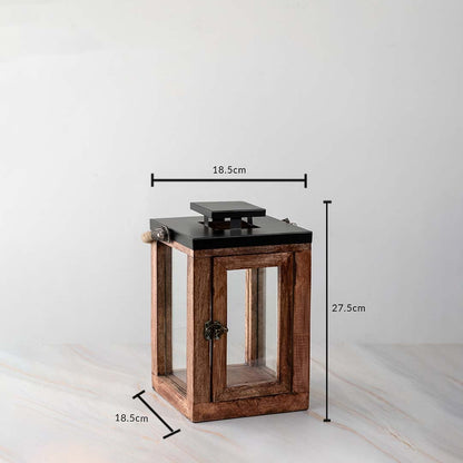 Rustic wooden lantern dimensions 27.5cm height and 18.5cm width with black top and glass panel sides.