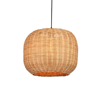 Natural rattan pendant light with round globe shape and tight woven texture hanging against soft neutral wall background for warm modern decor.