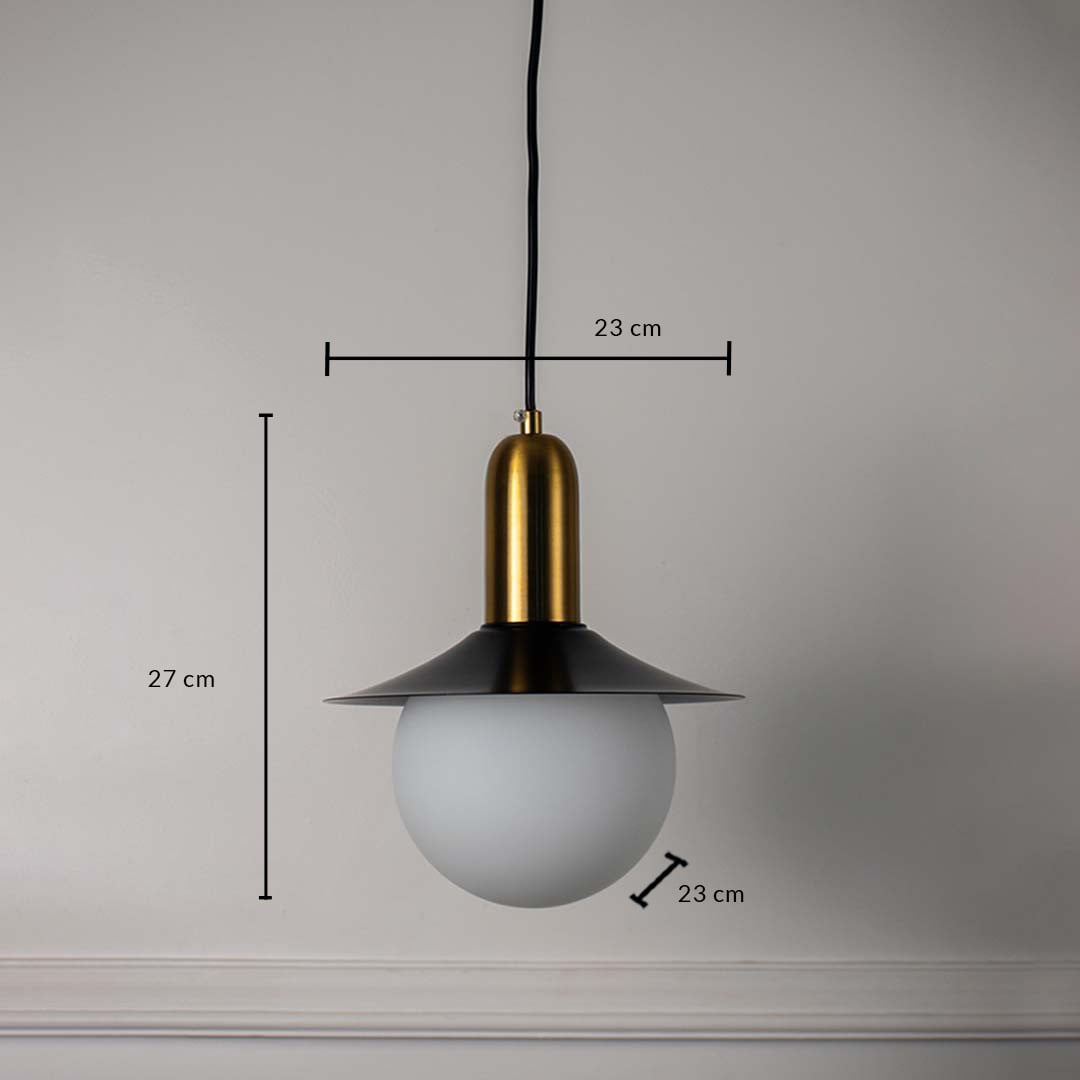 Dimension image of black metal pendant light with brass accents and frosted glass globe showing 27 cm height and 23 cm width.