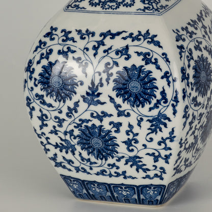 Closeup of blue and white ceramic vase with detailed floral pattern showcasing premium finish for elegant home decor styling.
