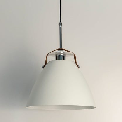 White pendant light off plain background featuring matte conical shade with metal rod and tan leather strap.
