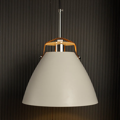 White pendant light turned on against dark backdrop highlighting its smooth matte finish and refined modern form.