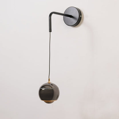 Table lamp look wall light shown with the light off on a white background featuring a matte arm and glossy shade for modern interior decor.