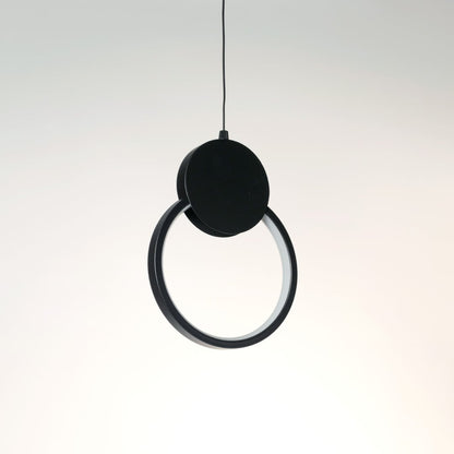 Modern black circular LED pendant light displayed off on white background for contemporary interior decoration.