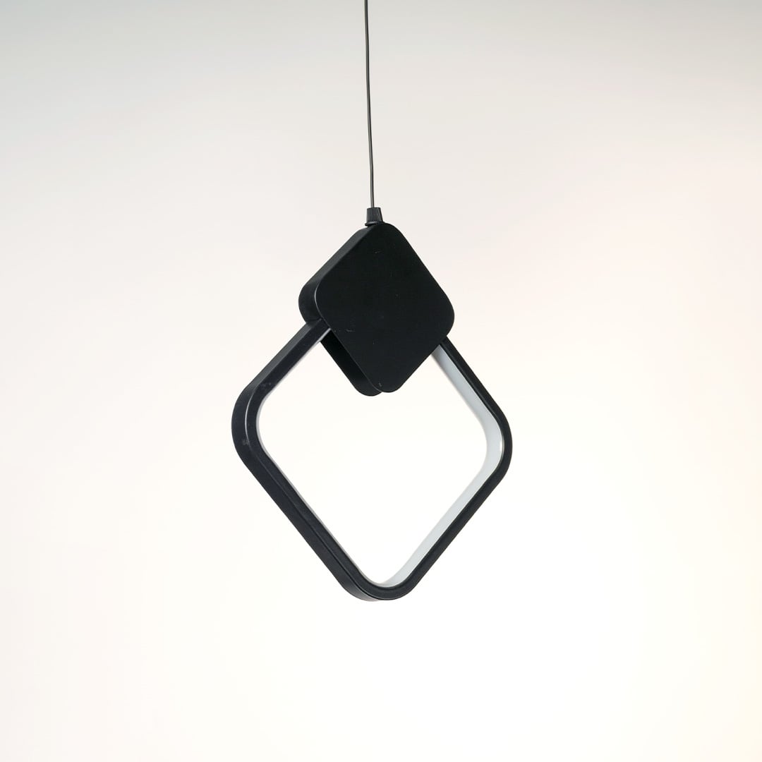 Contemporary black geometric LED pendant lamp with diamond frame shown off on white background for home lighting.