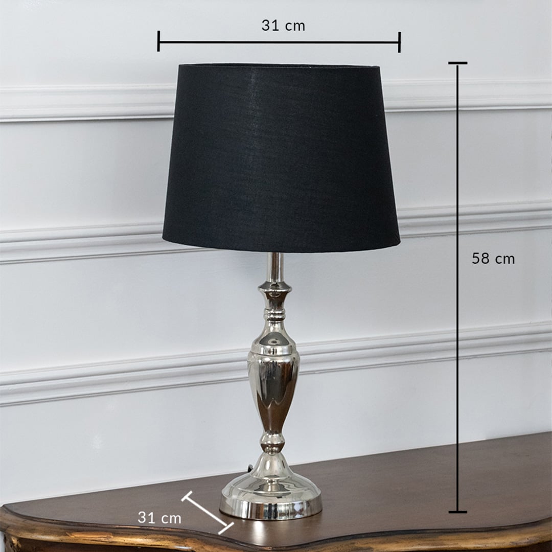Black table lamp with brass base dimensions 31 cm width and 58 cm height showcasing its ideal fit for any space.