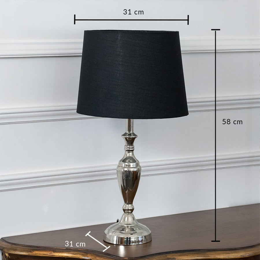 Black table lamp with brass base dimensions 31 cm width and 58 cm height showcasing its ideal fit for any space.