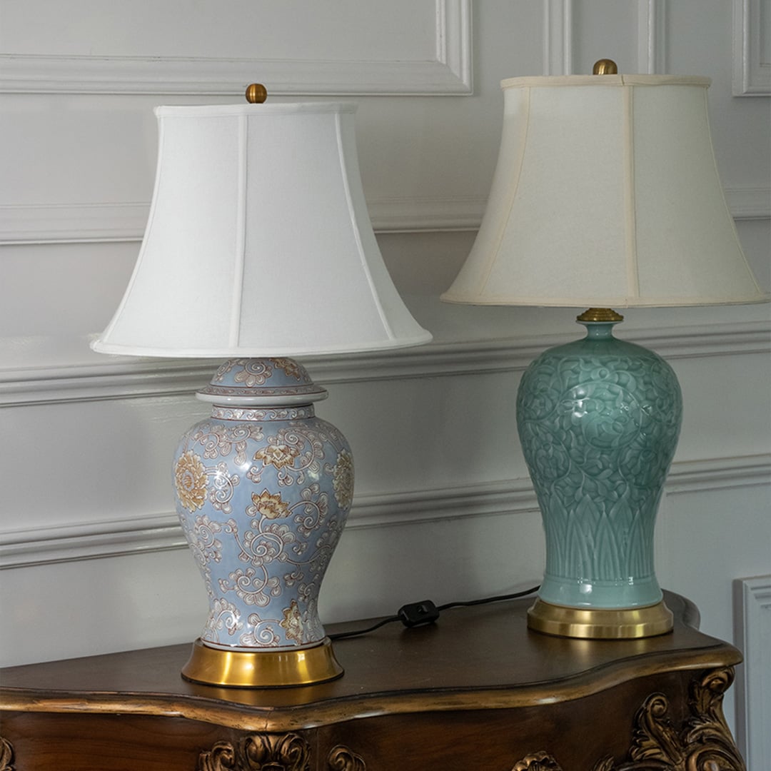 Blue and green ceramic table lamps with fabric shades offering refined traditional lighting and decorative home accents.