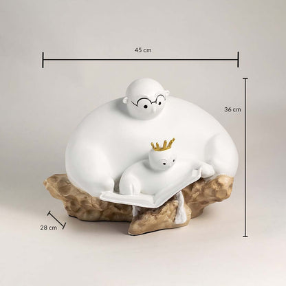 Parent and child sculpture in white ceramic with golden crown showing 45 cm length 36 cm height 28 cm width.