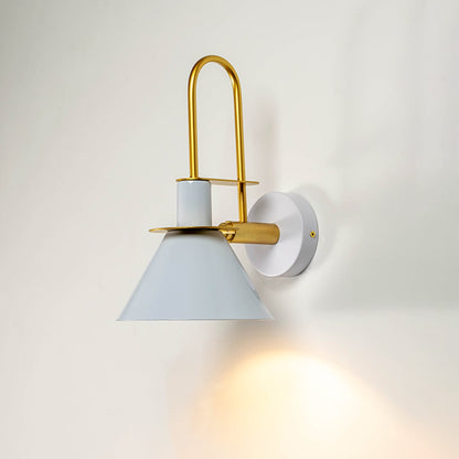 White and gold wall light glowing warmly against white wall ideal for bedroom or hallway modern lighting decor.