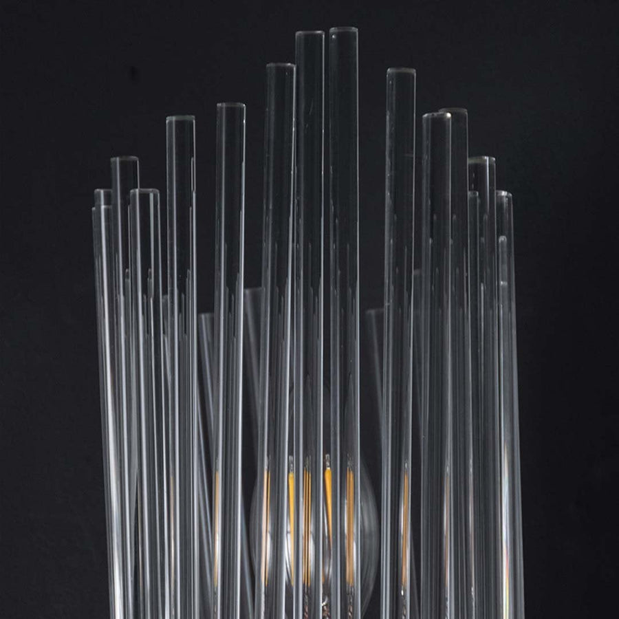 Detailed closeup of the metal band and glass rods of the wall light showcasing its modern luxury look for contemporary home decor.